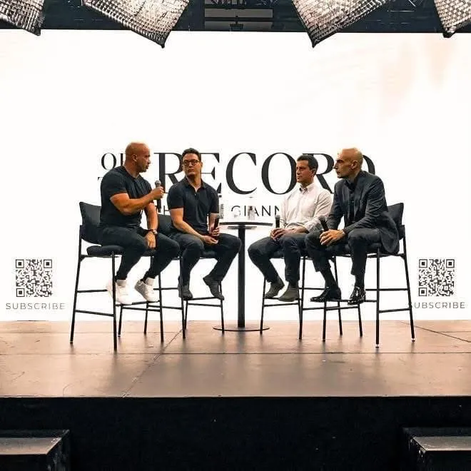 Pest Control Millionaires owners on stage at a live event