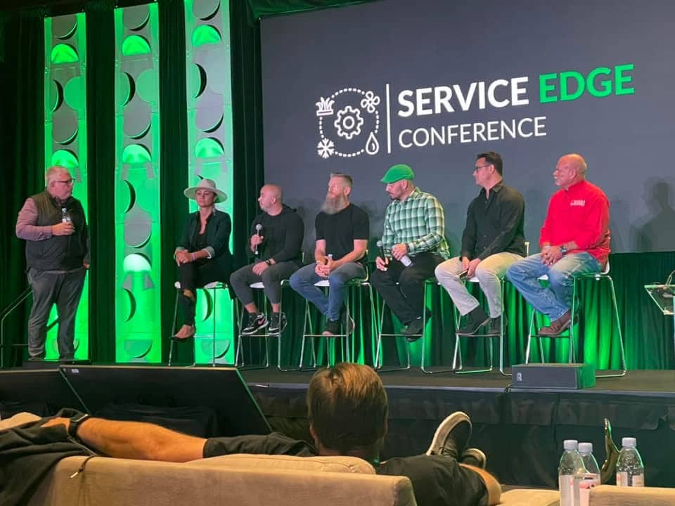 Pest control industry experts speaking on a panel at the Service Edge Conference